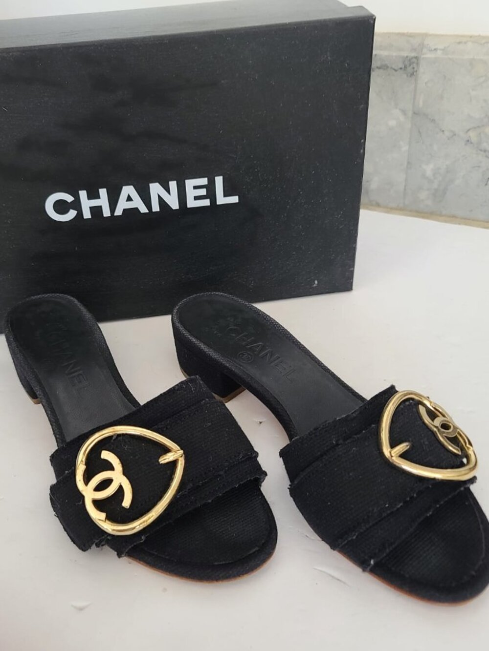 Chanel black canvas leather slip on slides
